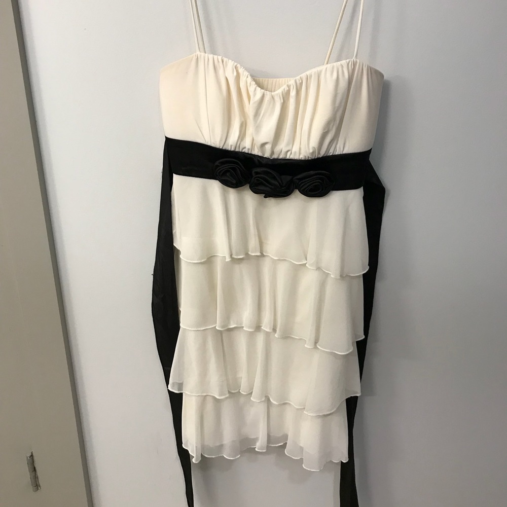 Ruffled white and black cocktail dress